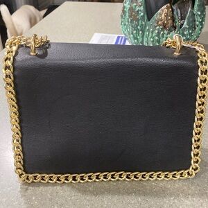 Black bag with gold chain